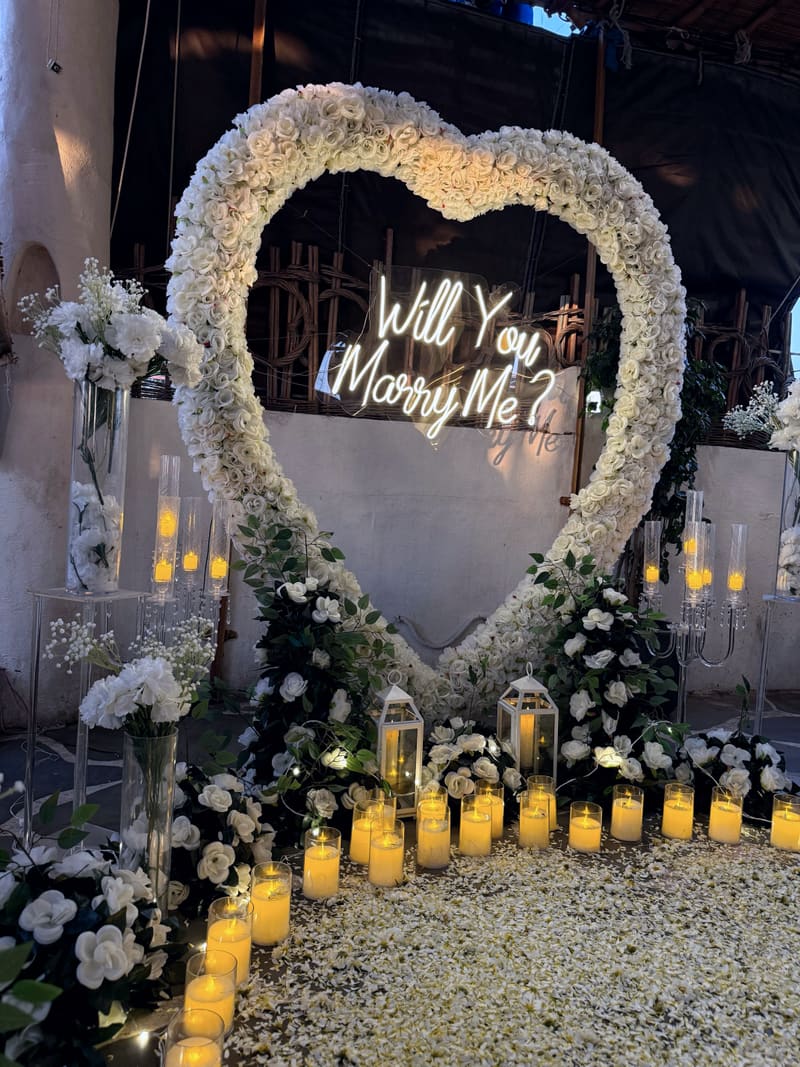 Proposal setup with candles and flowers by Cupid Vow, Chandigarh