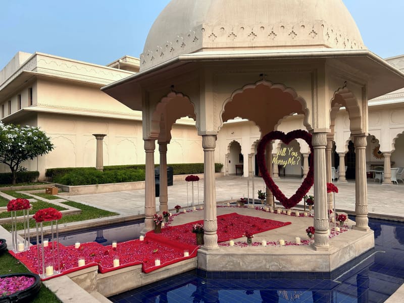 Proposal setup with candles and flowers by Cupid Vow, Chandigarh